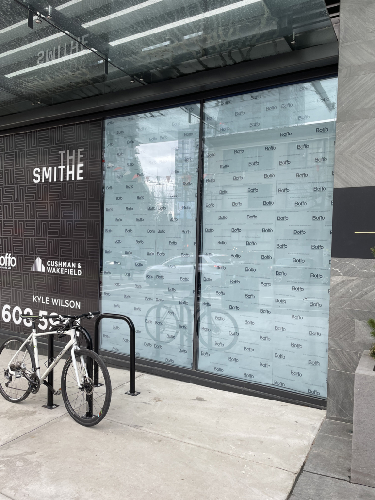 Branded window paper installed, Smithe St.,Vancouver, window paper graphics, Boffo Development