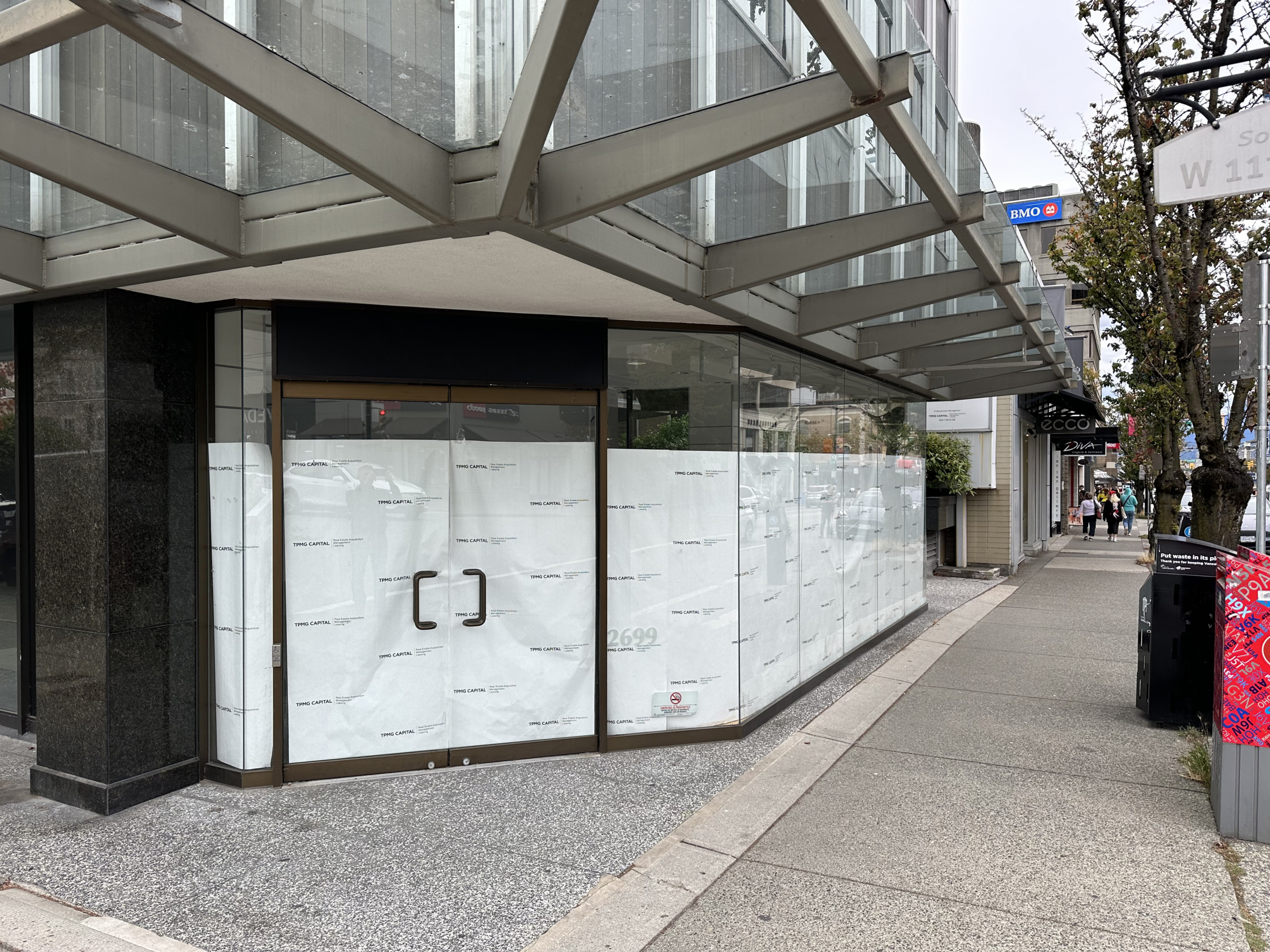 Custom Branded Window Paper for TPMG CAPITAL, Granville St., Vancouver, BC, Retail Space, Sidewalk