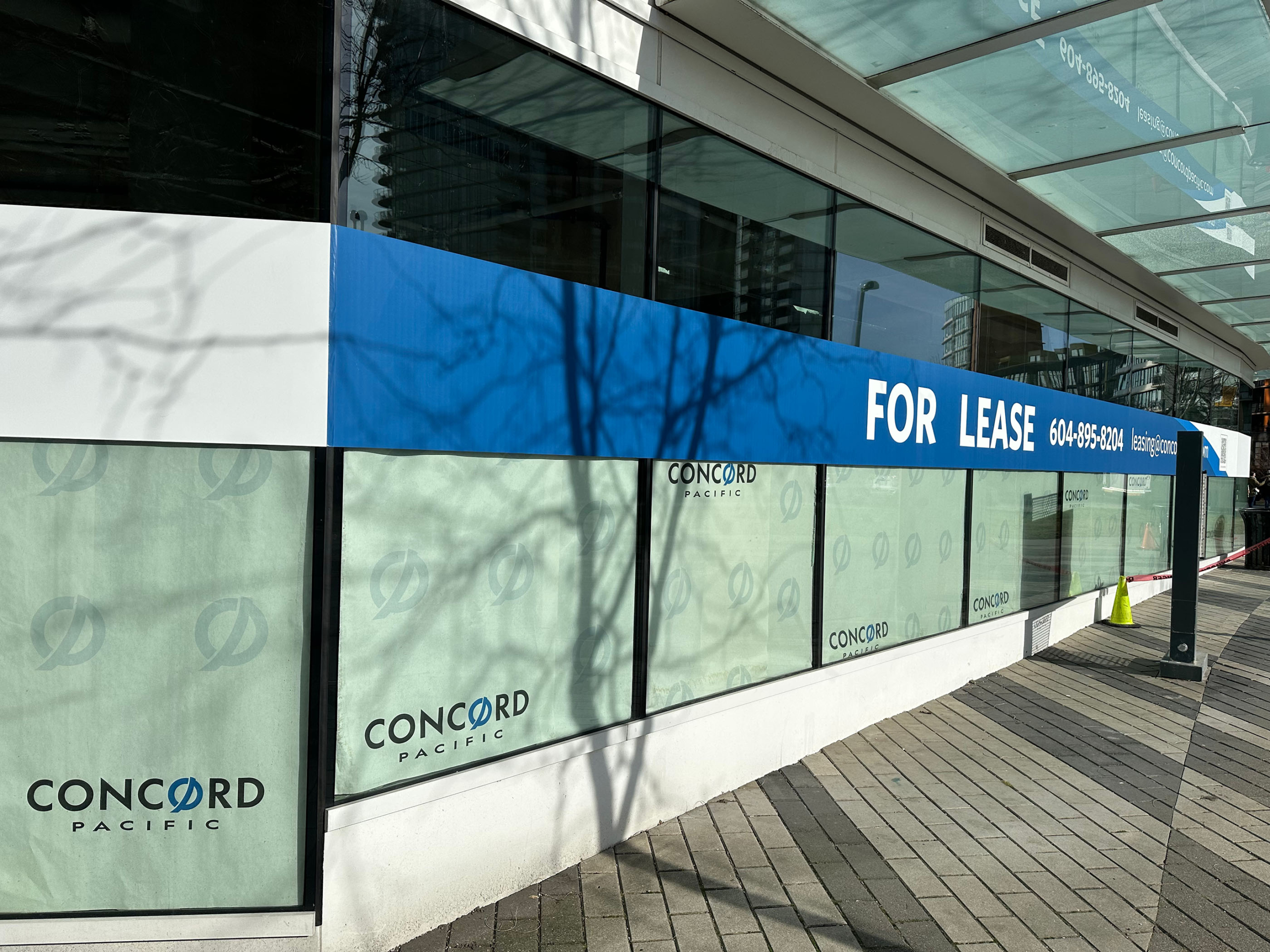 Branded Window Paper Installed at One Pacific by Concord Pacific, 68 Smithe Street, Vancouver 2024